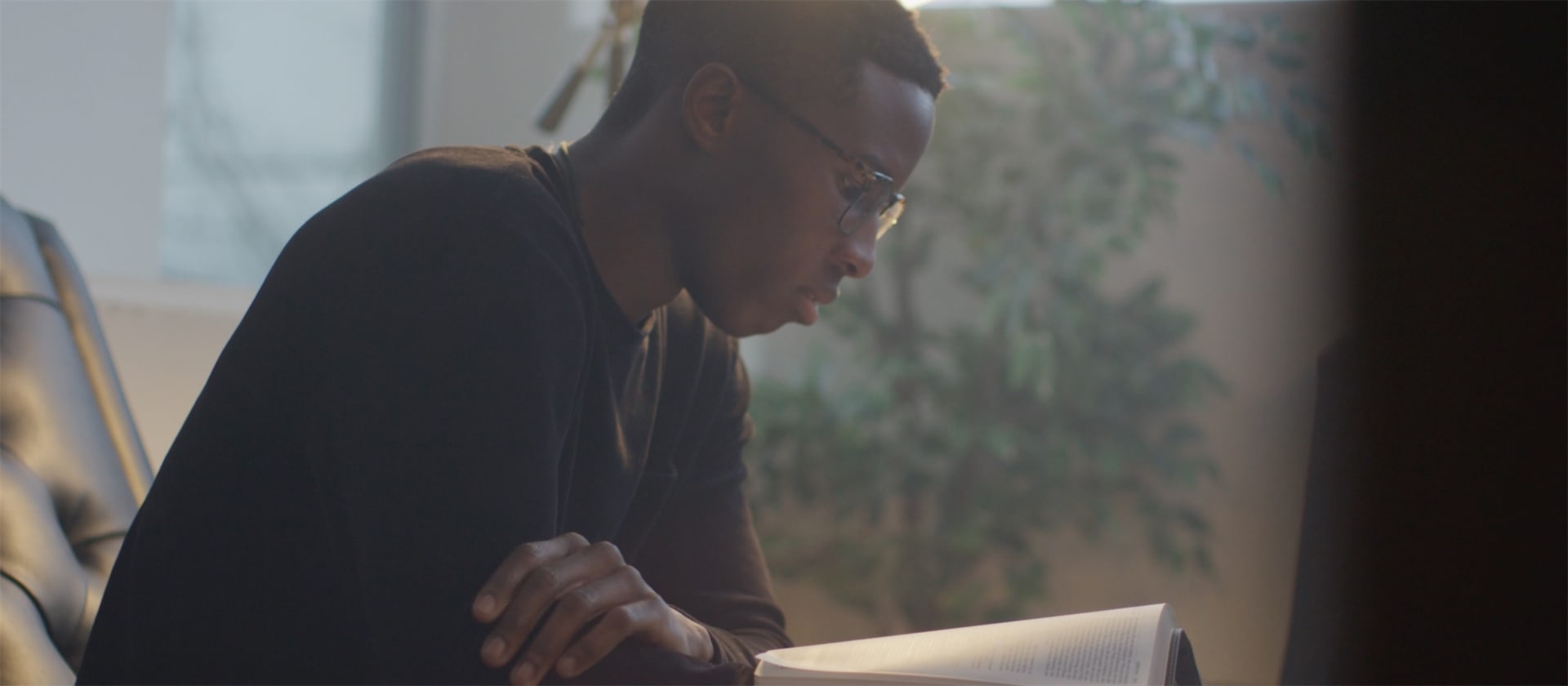 A man reading his bible A man reading his bible